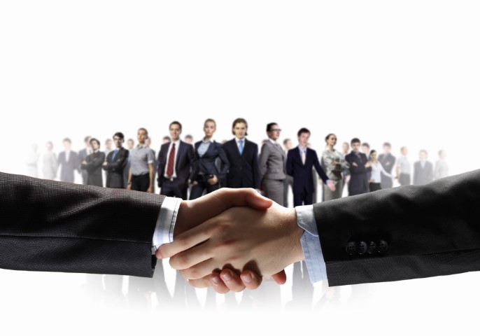 Shaking Hands Partners Standing Together on White Background