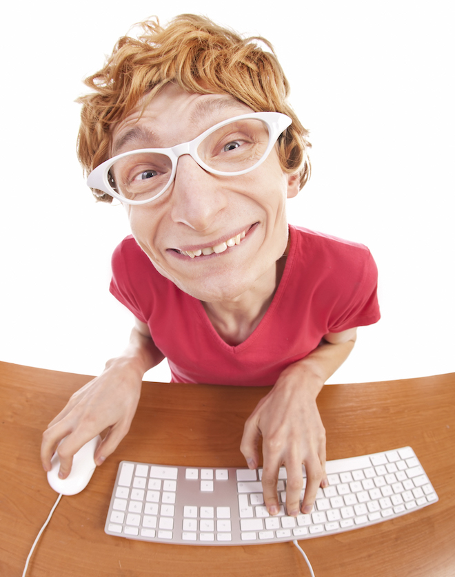 Quirky Looking Man at Keyboard